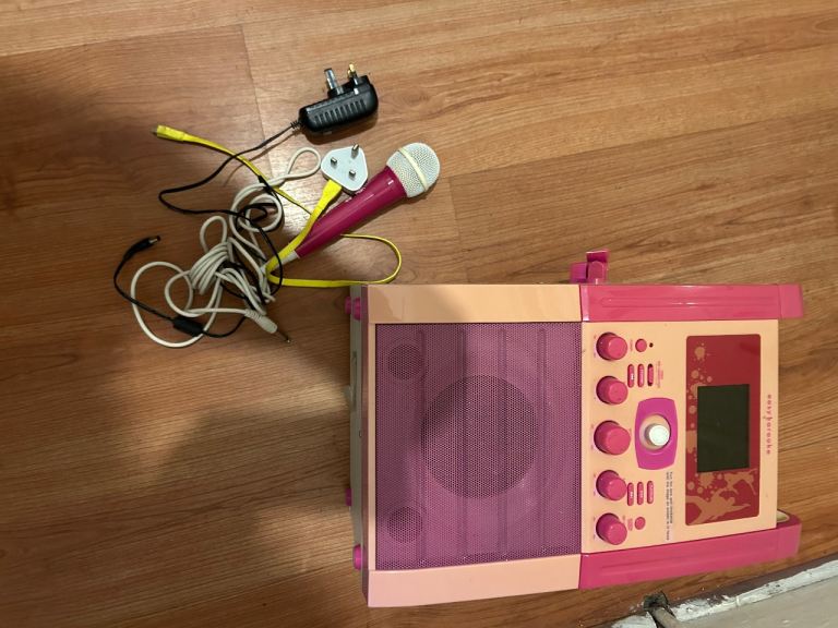 Karaoke machine with cd , camera , monitor screen , and mics