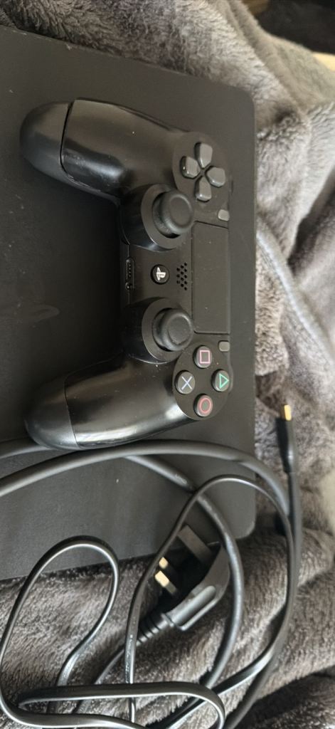 Sony PlayStation 4 Slim Console with Controller – Good Condition