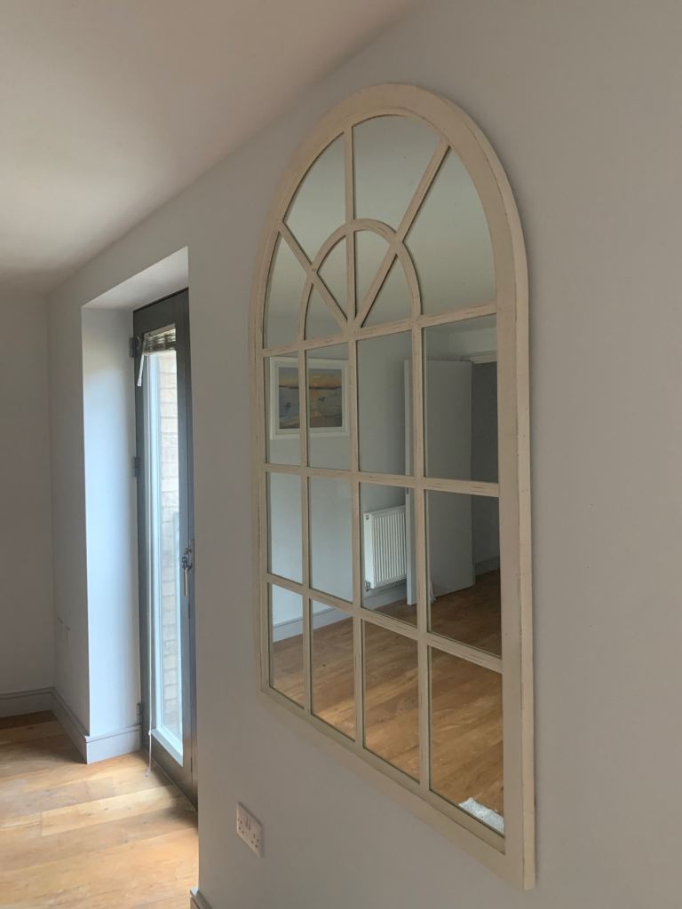 White arch mirror 
