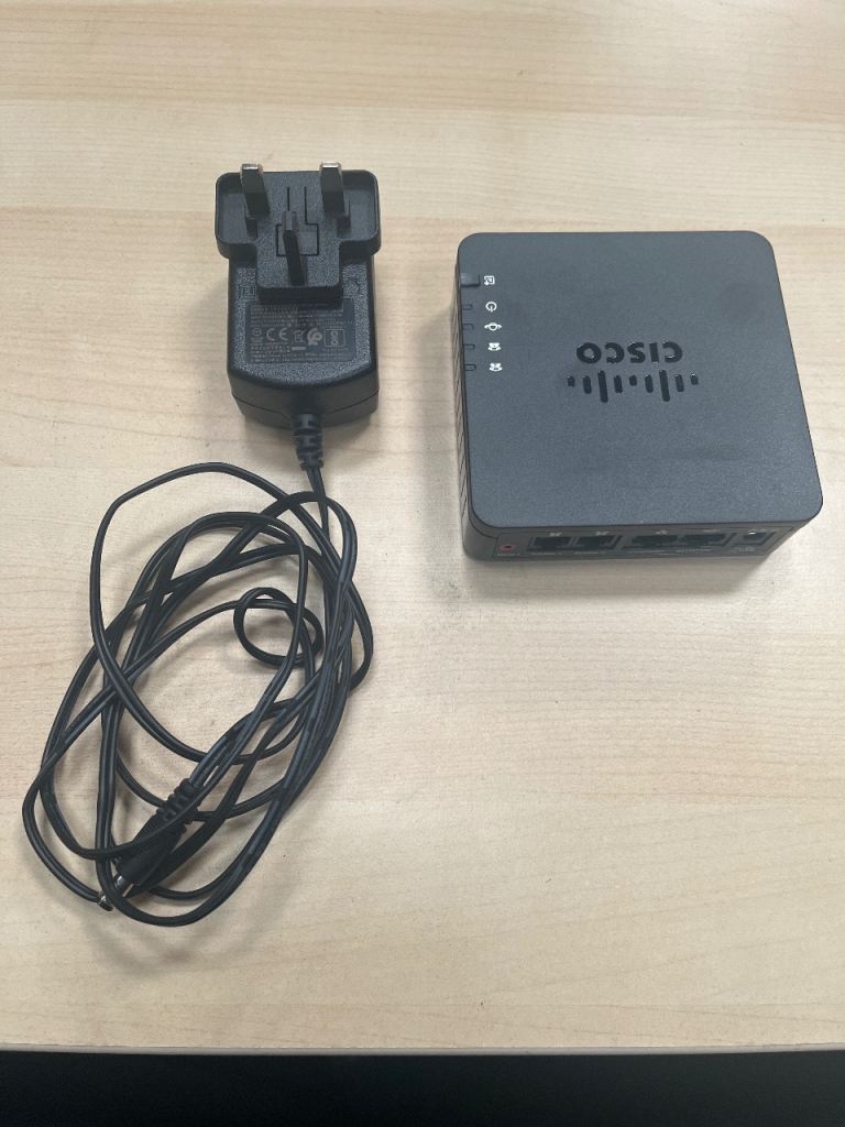 Cisco ATA Model ATA192 with Power Adapter – Good Condition