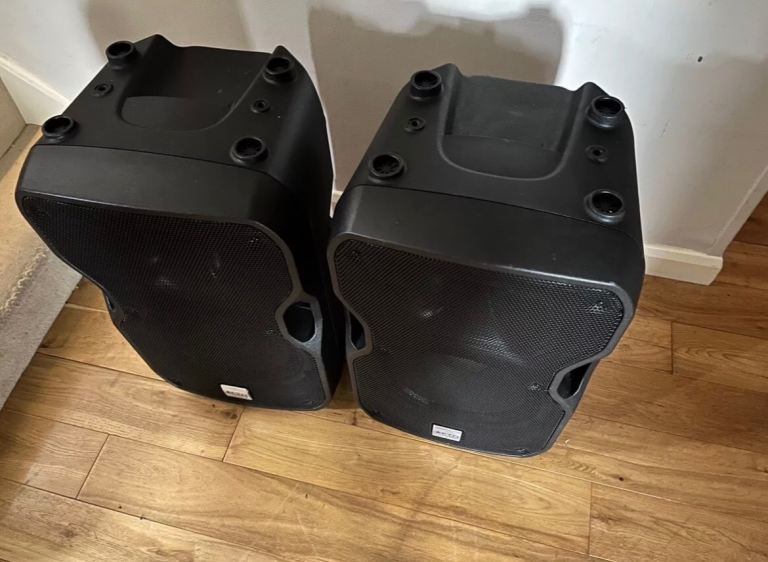2 x Rhino Active Speakers in very good order Inc protective covers and speaker stands