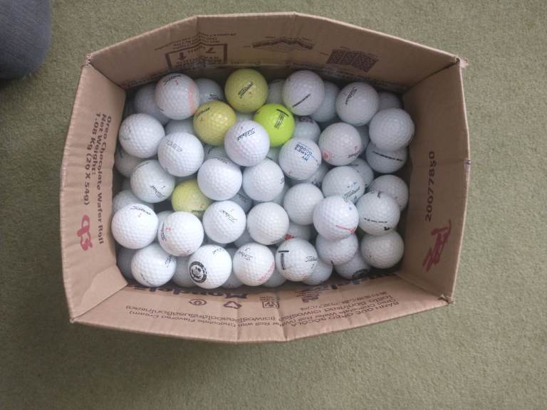 100 Titleist golf balls