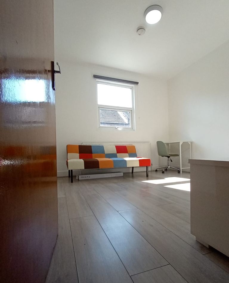 Large studio within separate kitchen 