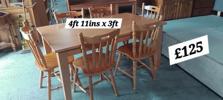 Solid wood dining g table with 6x matching chairs