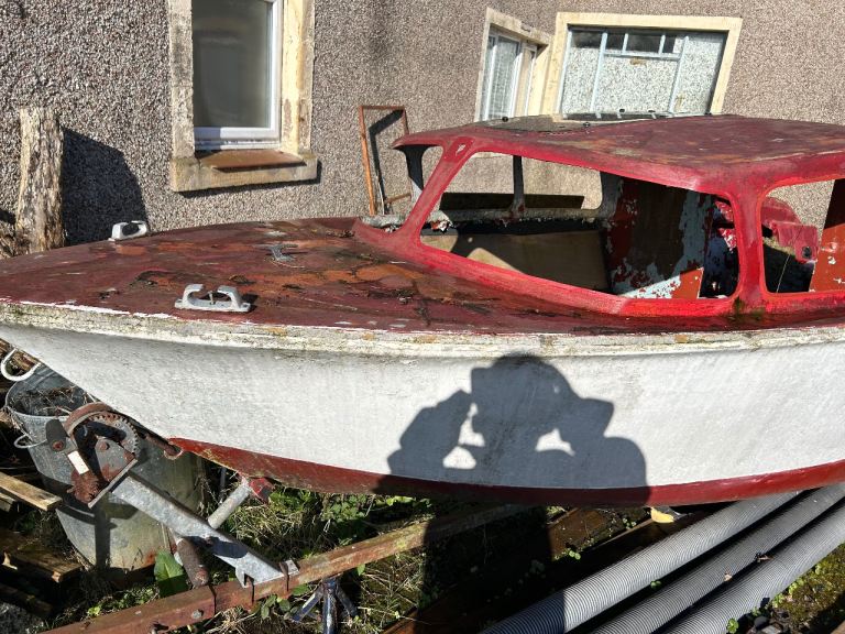 Small day boat and trailer