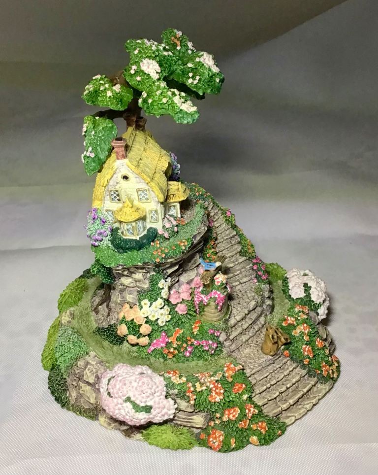 Wishing Well Cottage with protective glass dome