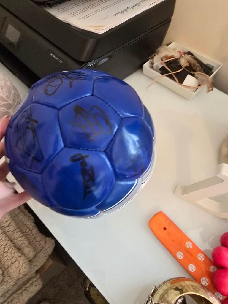 Everton signed football.
