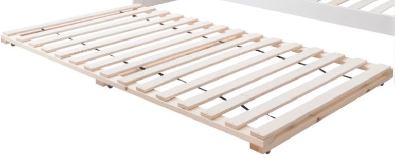 Single pull out trundle bed in pine. New in box.
