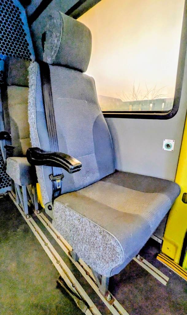 Van single seats with built-in seat belts 
