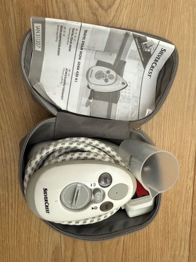 Compact travel stem iron