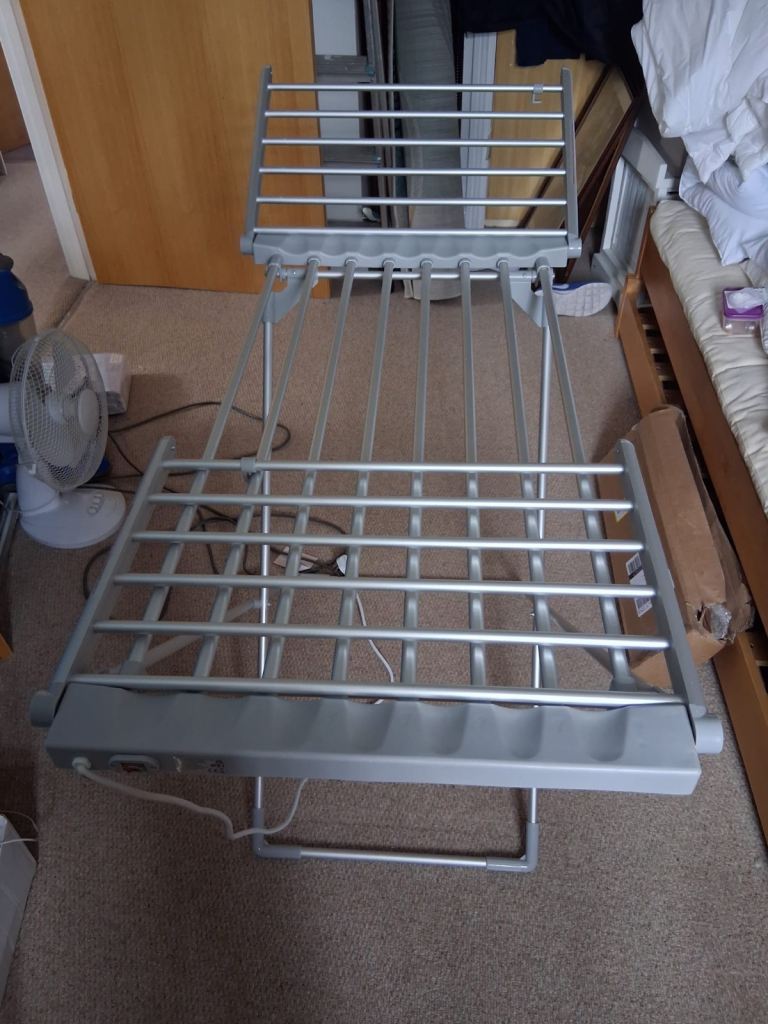 Heated clothes dryer 