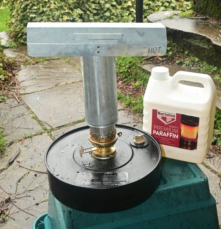 Nearly new Greenhouse Paraffin Heater & unopened 4L paraffin