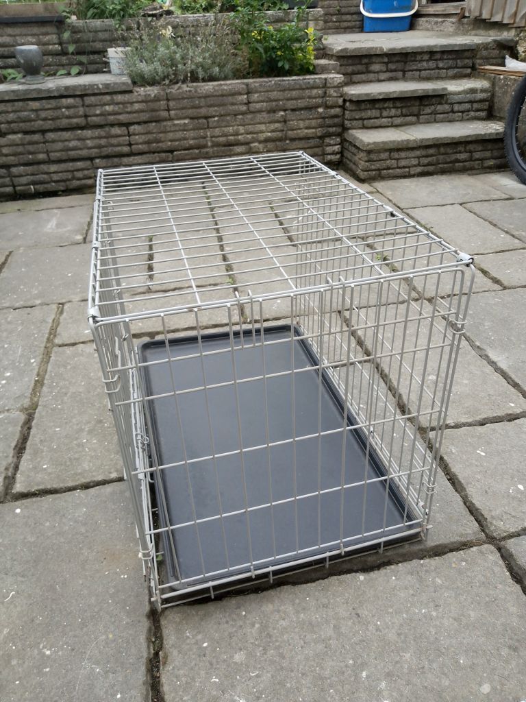 grey coloured dog den/ crate