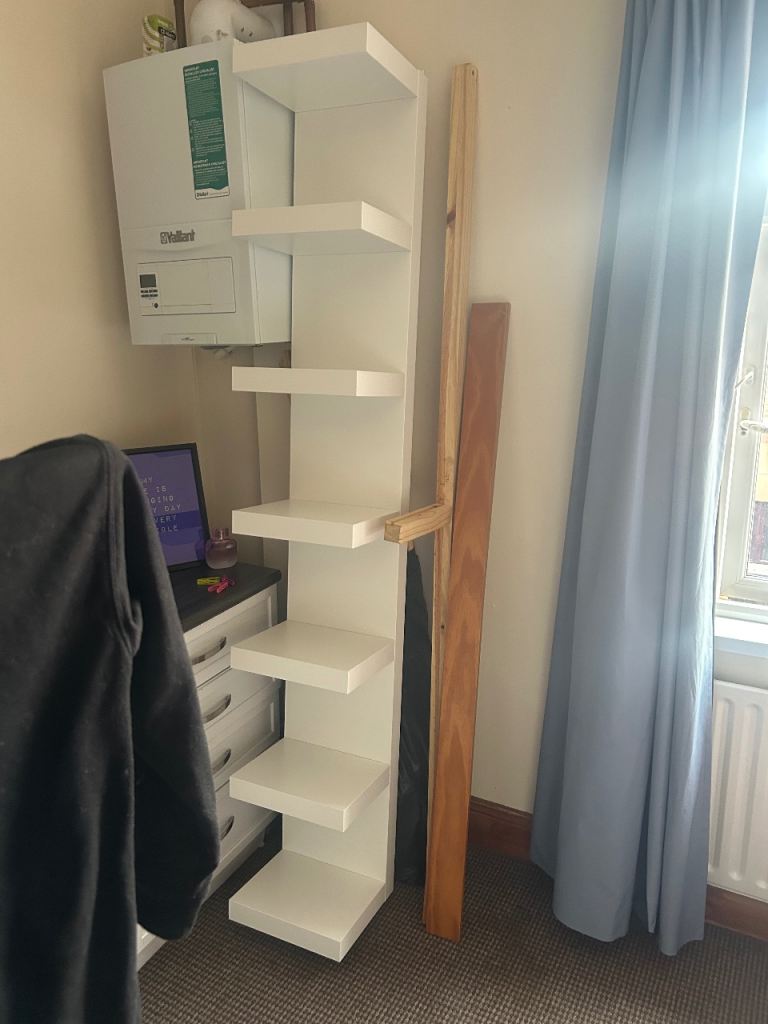 Tall white wooden book case, wall shelving unit 