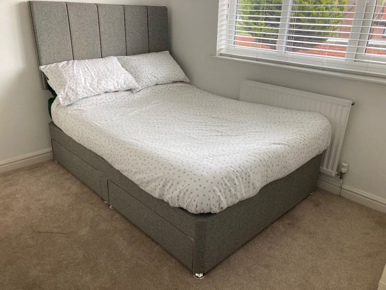 Double bed with drawers and headboard