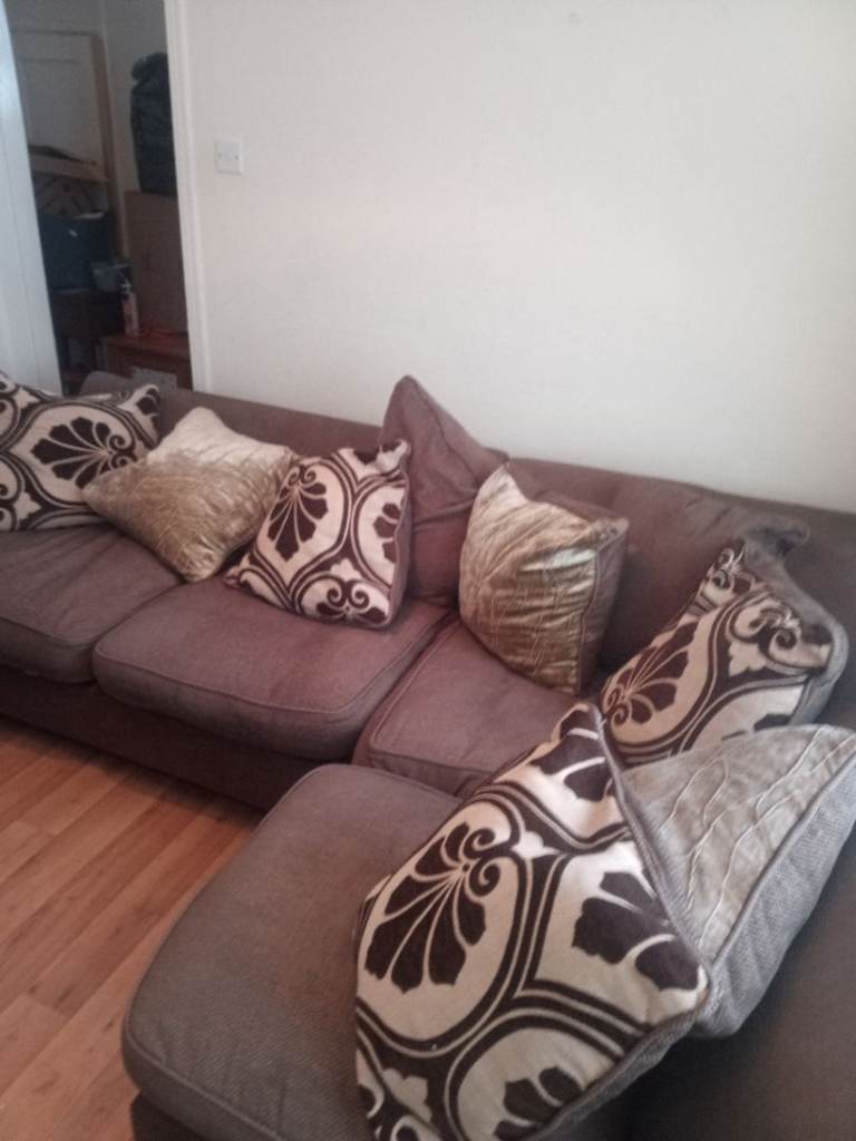 L-shaped Corner Sofa with Decorative Cushions