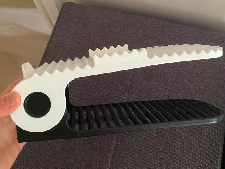 Adjustable White Plastic Shoe Holder