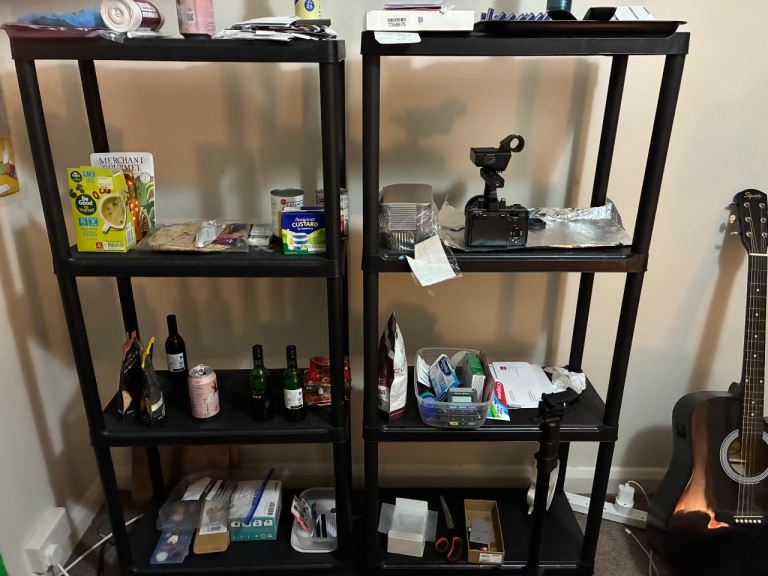 Two sets of plastic standing shelves