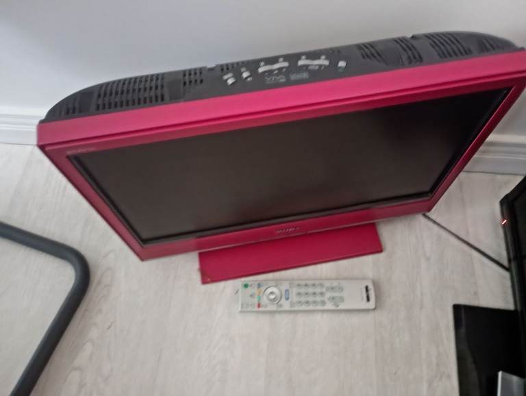 Stylish Red Flat Screen TV with Remote - Good Working Order