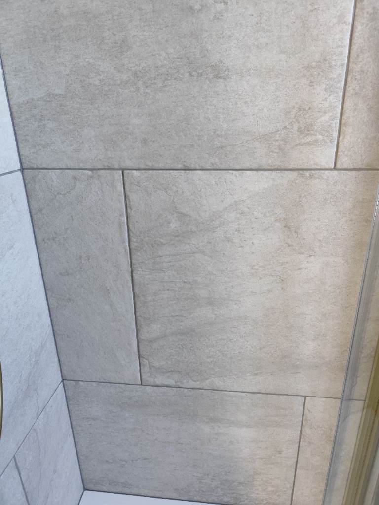 2 spare 60 x 90 ceramic tiles 