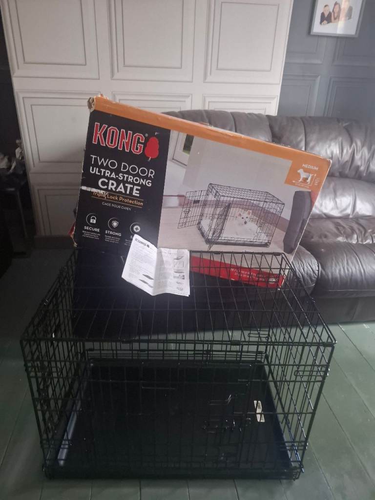Kong medium dog cage .