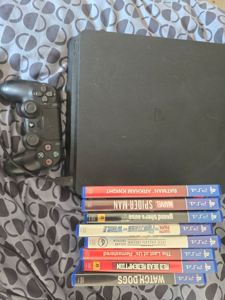 PS4 Console with One Controller and 8 Games