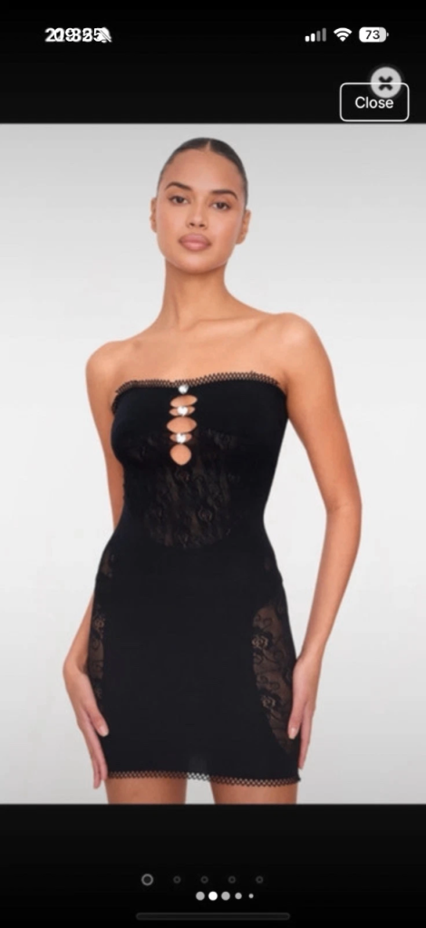 Black sheer cut out mini dress Size M / L