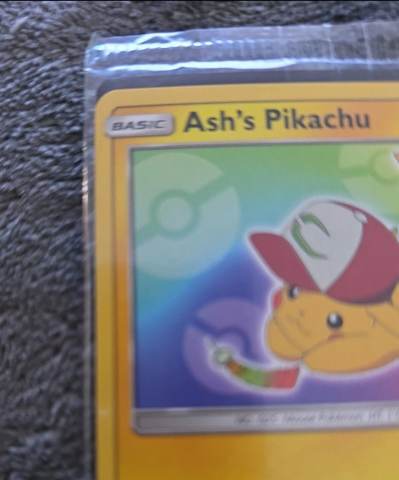 pokemon i choose you movie pikachu card Ash's Pikachu (SM108) [Sun & Moon: Black Star Promos] Near Mint