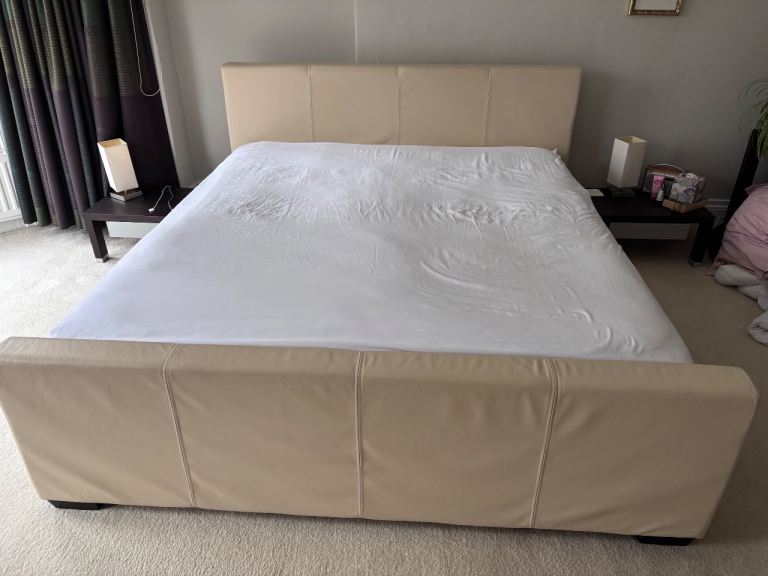 Beautiful cream leather super king bed frame with headboard. 
