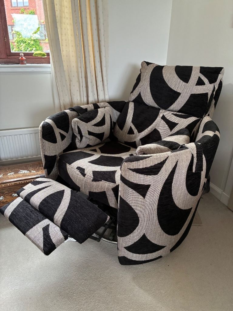 Fama reclining swivel chair