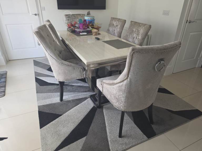 Marble top dining table with 8 chairs