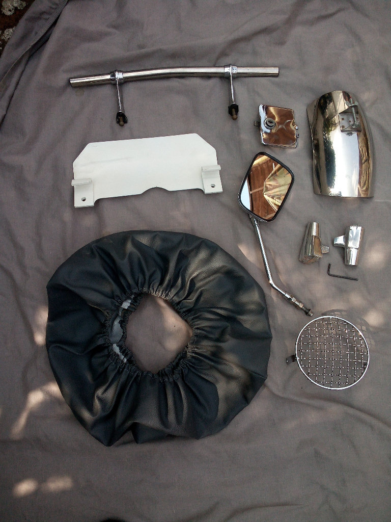 Lambretta,mirror,wheelcover,badgebar,standfeet,splashplate,inner mudguard,petrol lid,light grill.