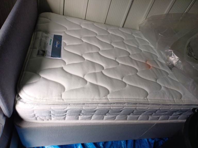 Two drawer single bed + slumberland mattress and mattress topper + headboard.  Only used 3 times