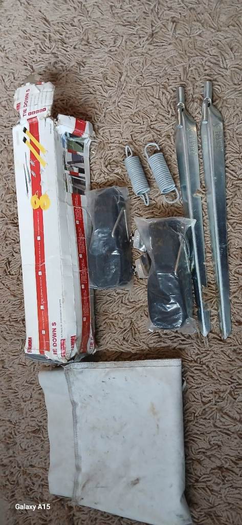 Awning tie down straps