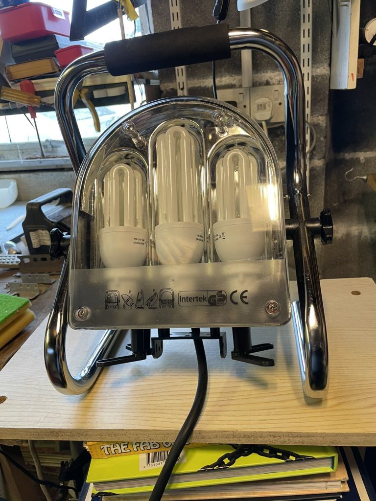 image for Brand New unused 110v work light with built in extension sockets £10