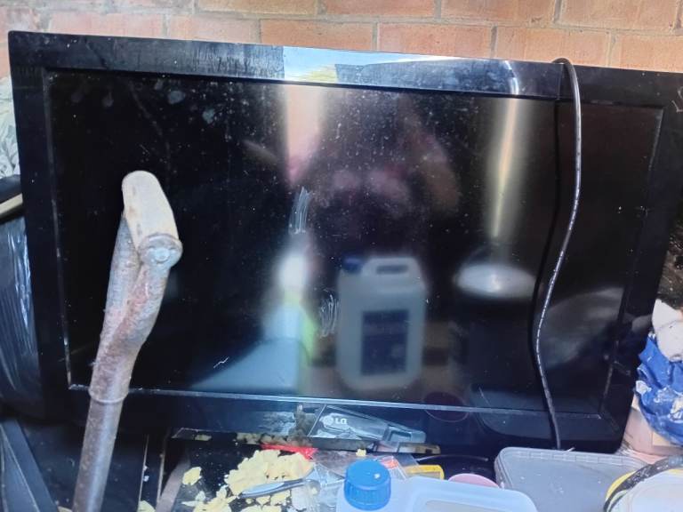 TWO BROKEN TVs