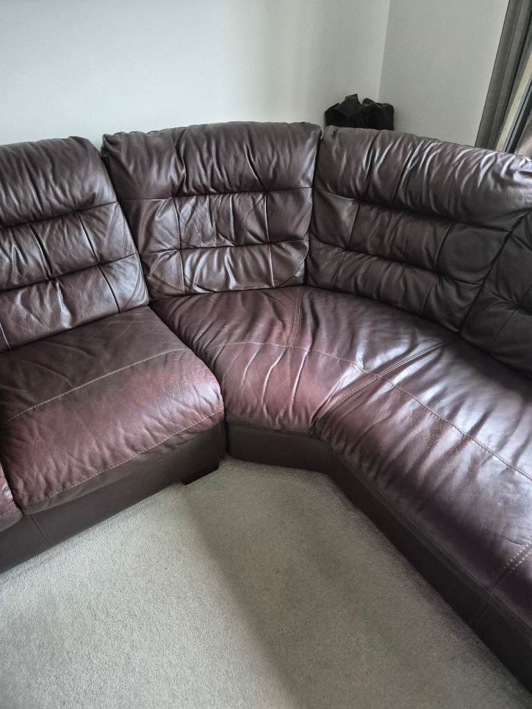 L shaped brown sofa