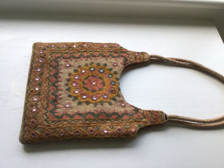 Brown fabric handbag