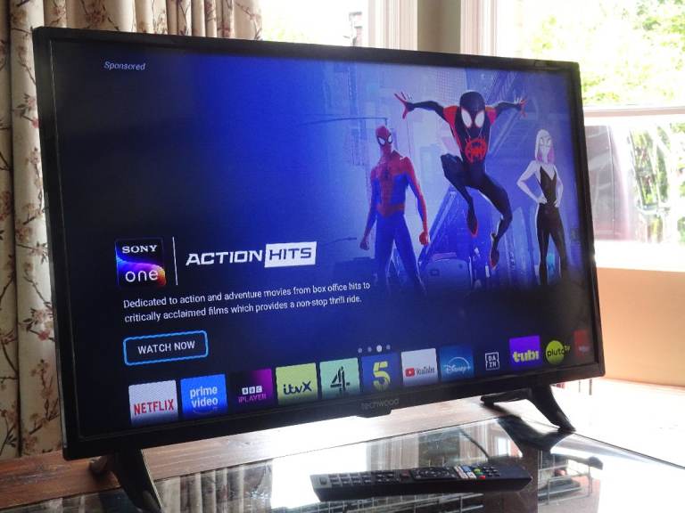 Black Techwood 32" Smart TV in Excellent Condition with Stand & Remote Control