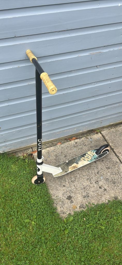 Zinc Stunt Scooter – Black and White, Fair Condition
