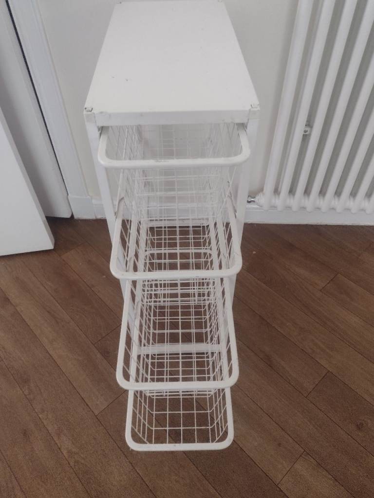 White Metal Storage Unit with Four Pull-Out Wire Baskets