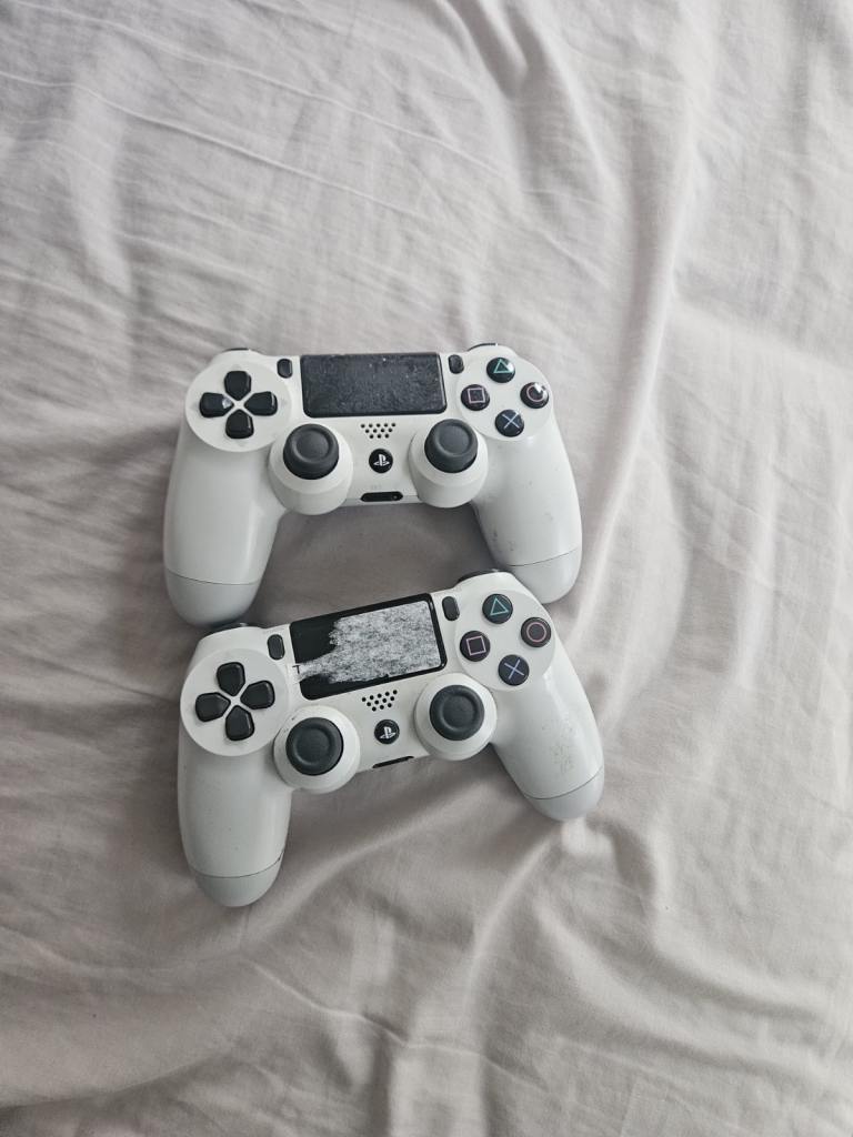 PS4 controllers bundle x 2 white good condition 