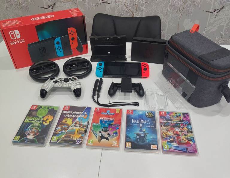 Nintendo Switch Console Bundle with Games and Accessories – Good Condition