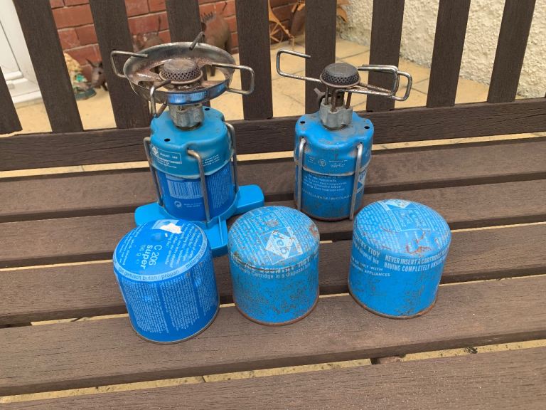 Two single camping gaz stoves with three spare canisters