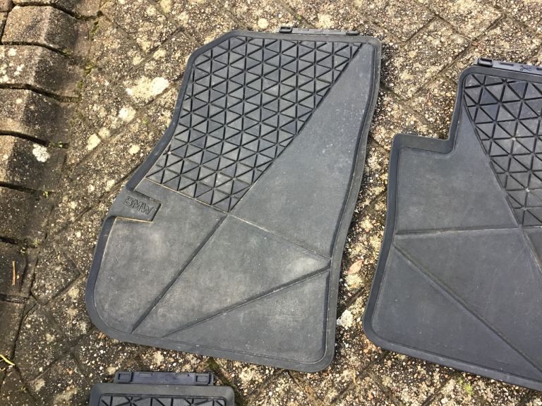 Genuine BMW front and rear rubber mats