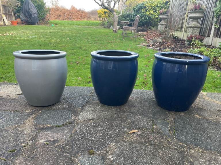 Circular fibreglass plant containers