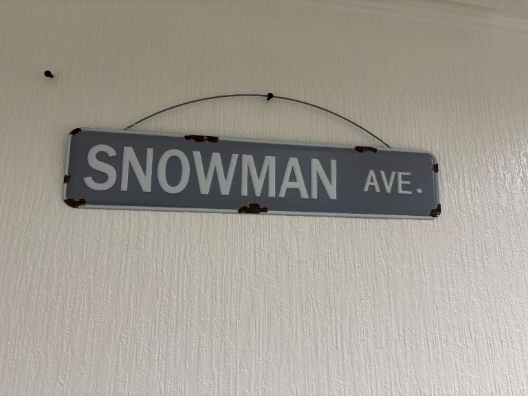 Snowman Ave. Metal Sign – Grey, Good Condition