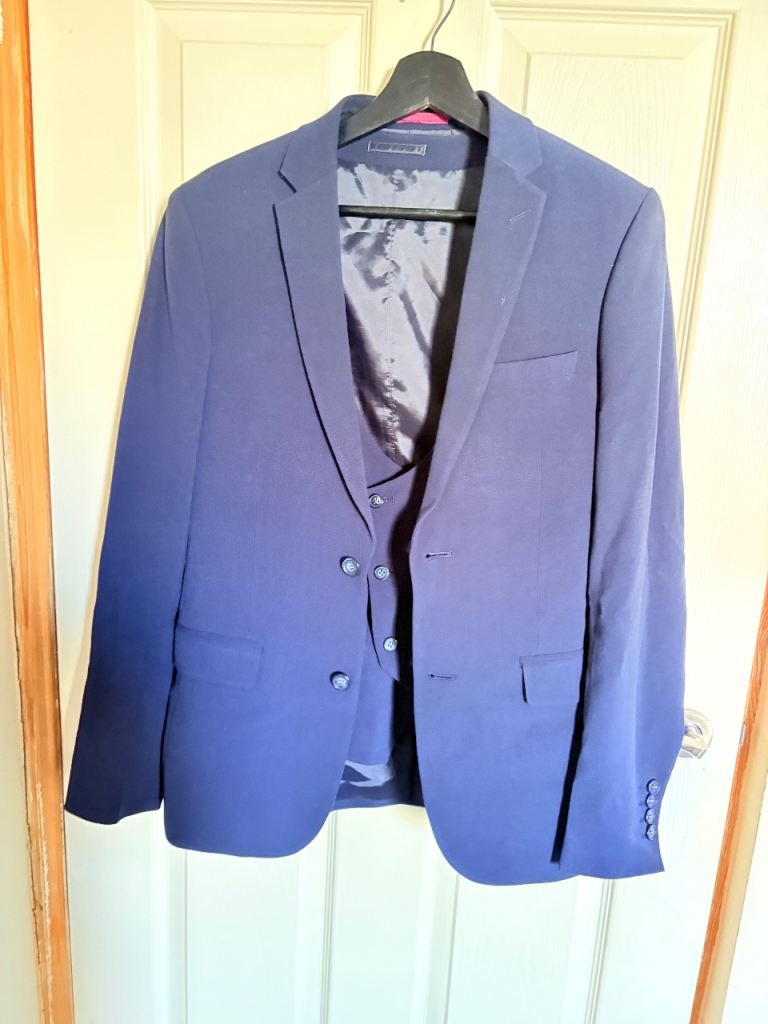 Three piece branded mens suit