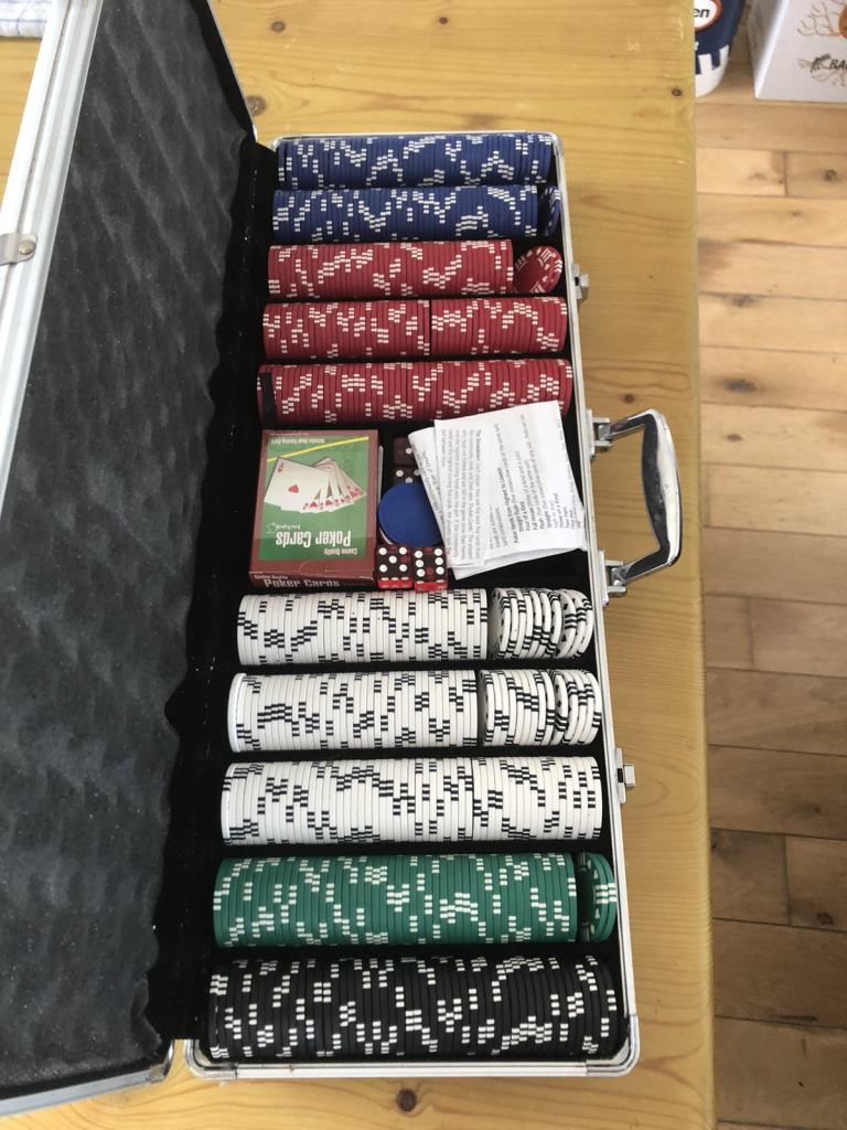 Gaming chips with cards and dice 