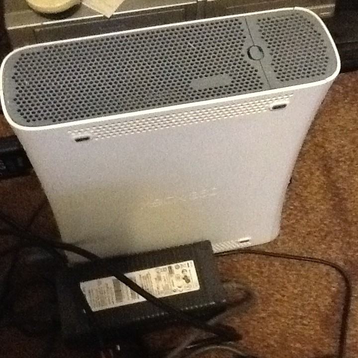 X BOX 360 plus 5 Games and Controller/Power Pack.